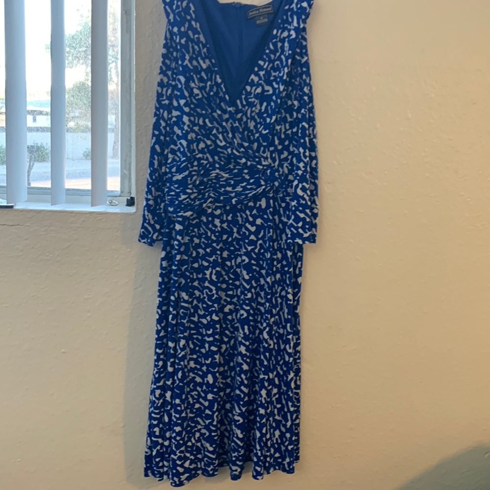 Blue dress Jessica Howard length 36 inches arm pit 18 inches waist 15 inches.